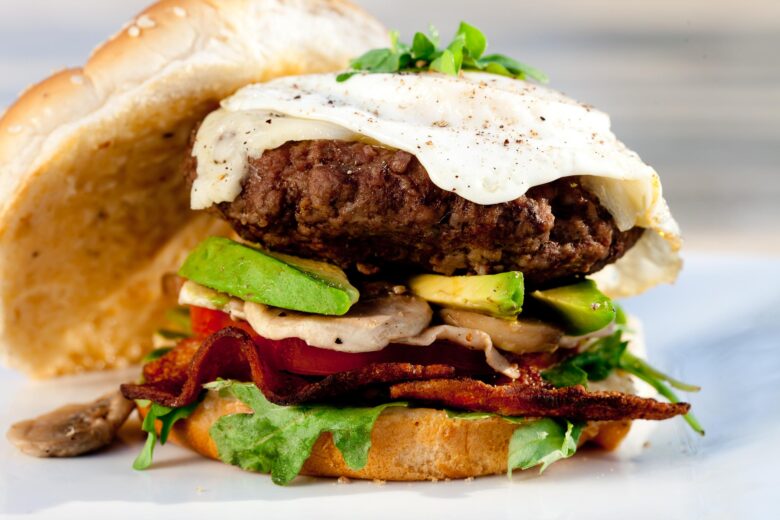 Fried Egg Burger with Avocado, Bacon, and Lettuce