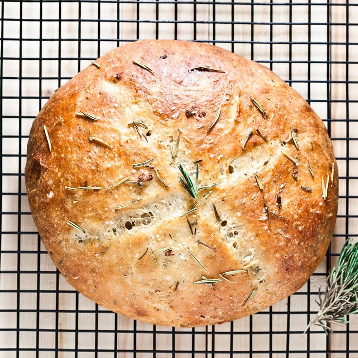 Rosemary Garlic Bread Loaf on a cooling rack. 