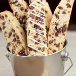 almond chocolate chip biscotti cookies in a tin