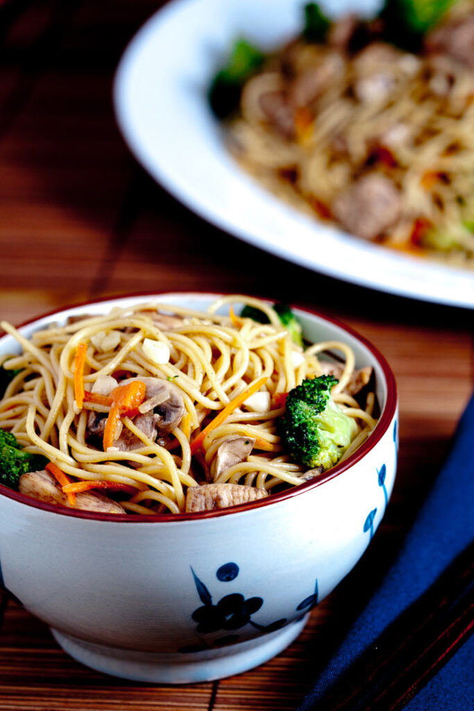 Chicken Chow Mein with Vegetables In a bowl and plate