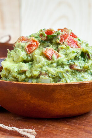 Guacamole in a wooden bowl