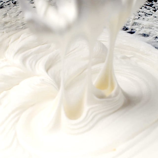Cream mixture beaten to form stiff peaks.