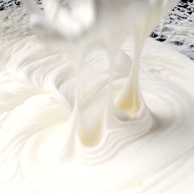 Cream mixture beaten to form stiff peaks.