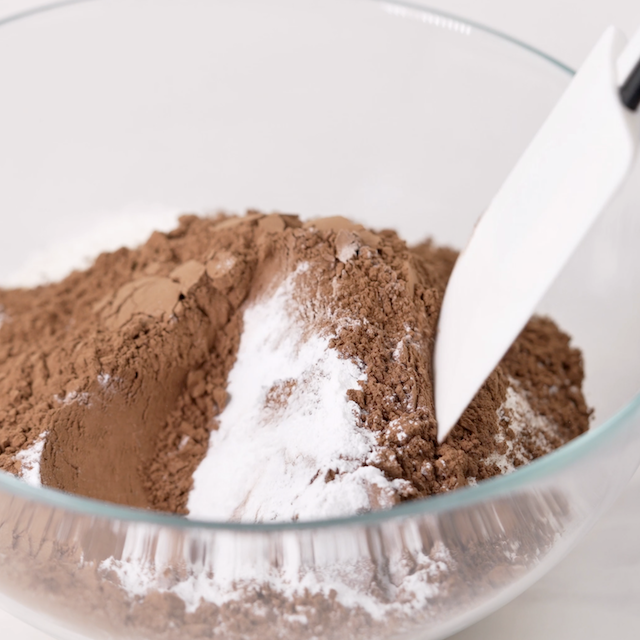 Dry ingredients being mixed to make peanut butter fudge cookies.