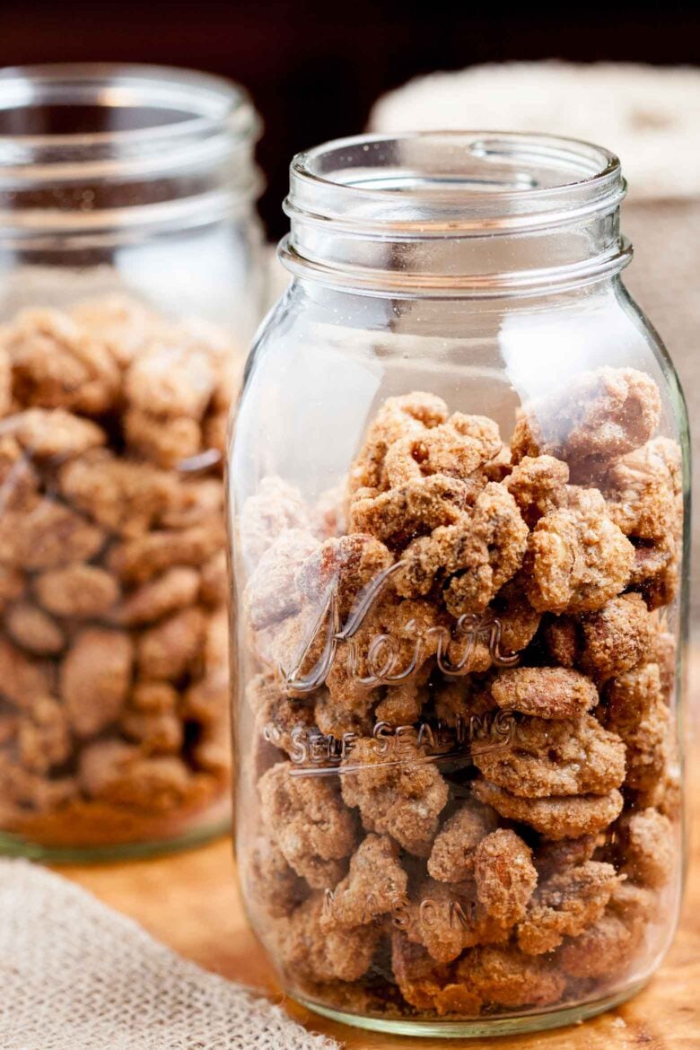 candied pecans in mason jars.