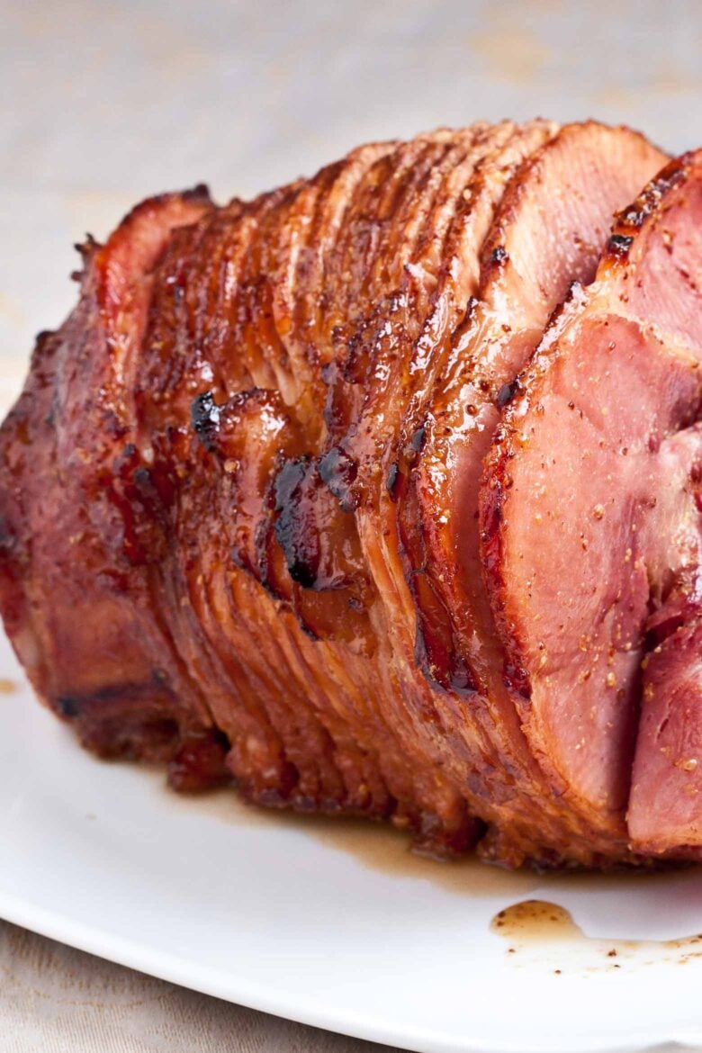 honey baked ham spiral sliced on a plate.