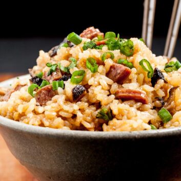 Chinese sticky rice in a bowl with chopsticks