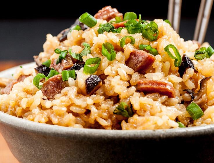 Chinese sticky rice in a bowl with chopsticks