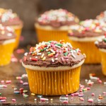 Yellow Cupcake with Chocolate Frosting and Sprinkles