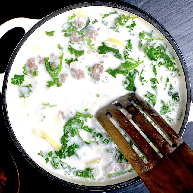 Homemade zuppa toscana being simmered in a pot.
