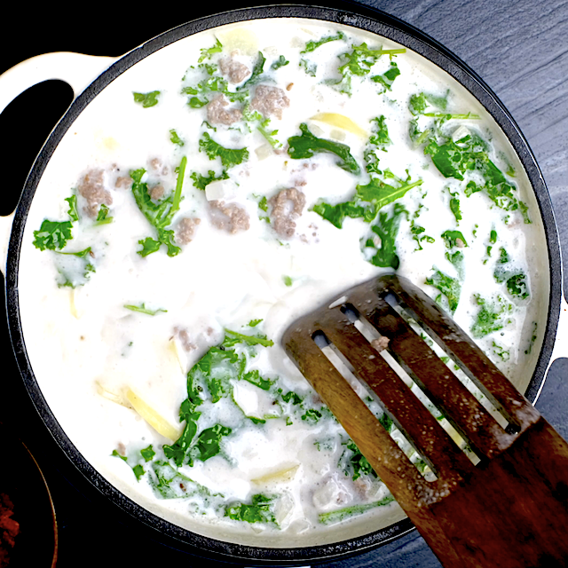 Homemade zuppa toscana being simmered in a pot.