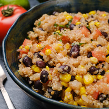 Mexican quinoa with black beans and corn in a bowl.