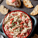 imitation crab dip in bowl with crackers