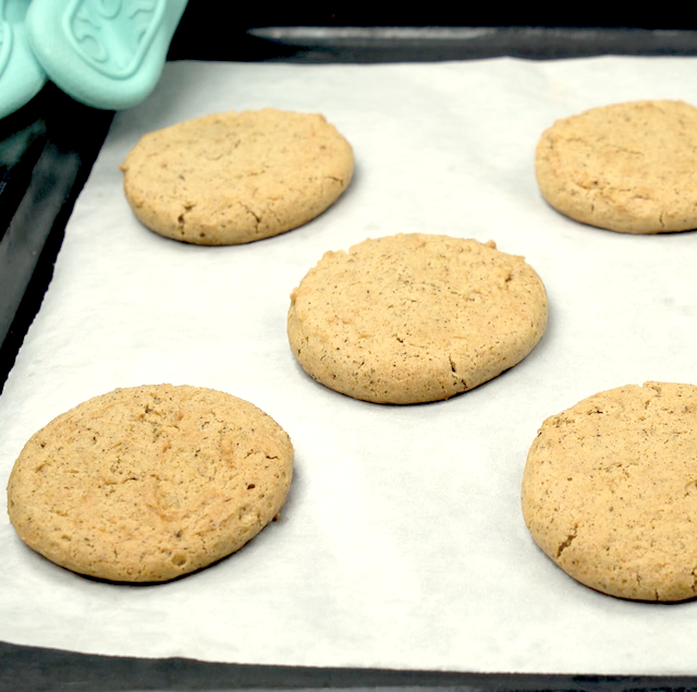 Freshly baked pumpkin cookies cooling in the pan.