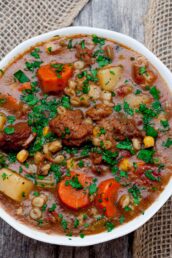 Beef and Barley Stew in a Bowl with Spoon