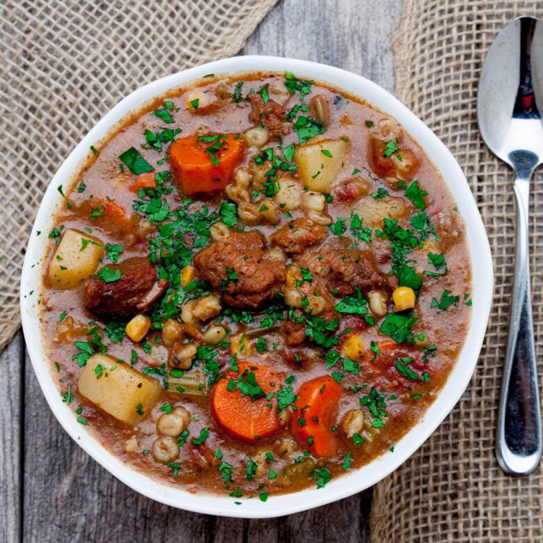 Beef and Barley Stew in a Bowl with Spoon