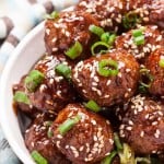 Glazed Meatballs with Sliced Onion and Sesame Seeds