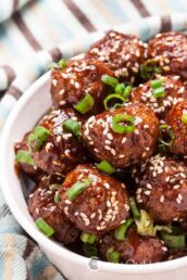 Glazed Meatballs with Sliced Onion and Sesame Seeds