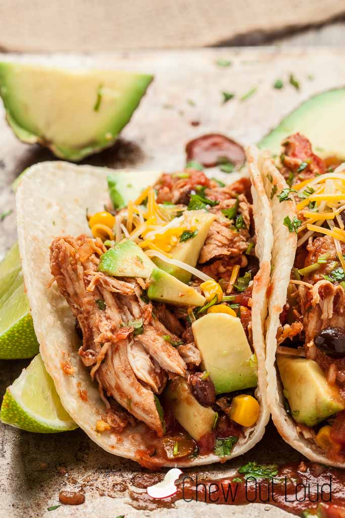 slow cooker salsa chicken in tacos and burritos