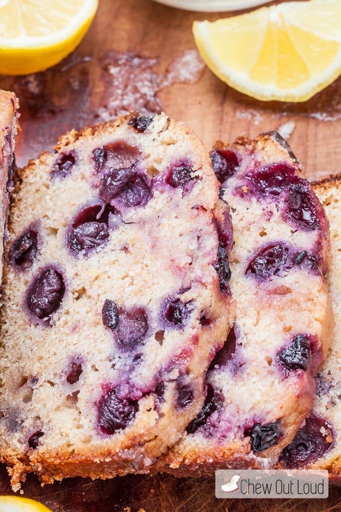 sliced blueberry bread with lemon glaze