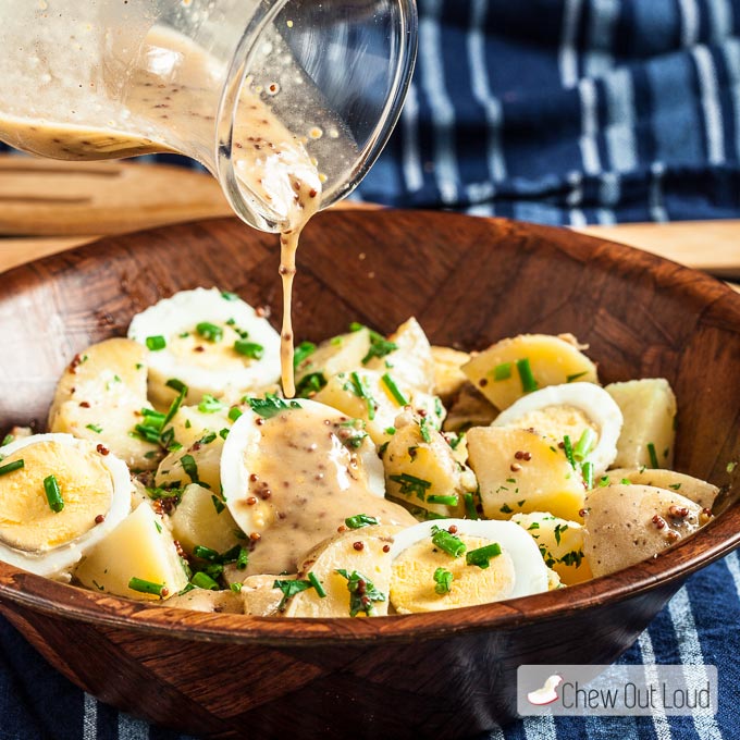 Potato Salad with eggs and honey mustard vinaigrette in bowl