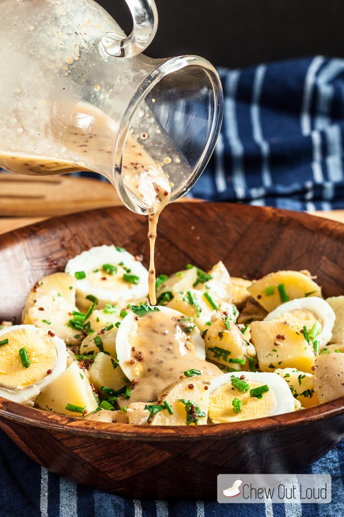 healthy potato salad recipe with dressing in a bowl
