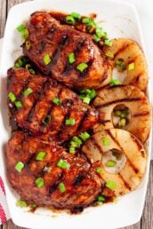 Huli Huli Chicken with grilled pineapple on a plate
