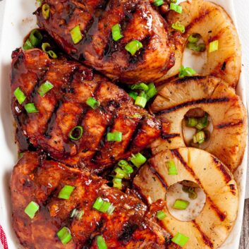 Huli Huli Chicken with grilled pineapple on a plate