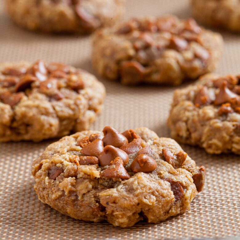 pumpkin oatmeal cookies on a baking sheet.