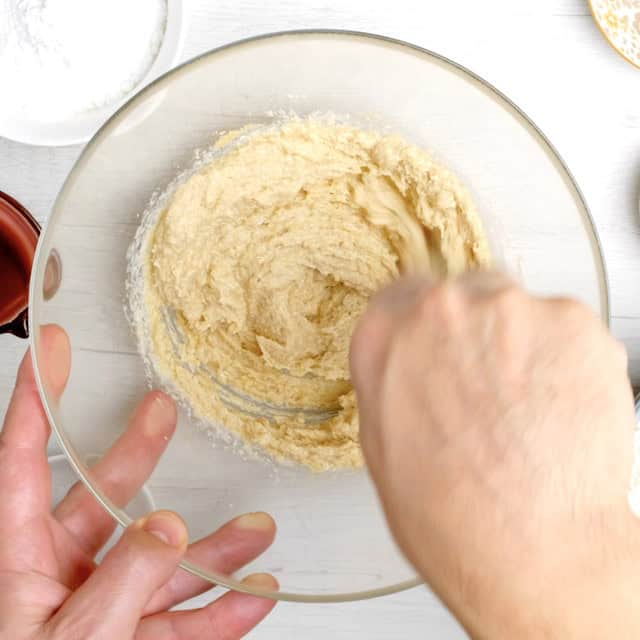 Butter and brown sugar being creamed together.