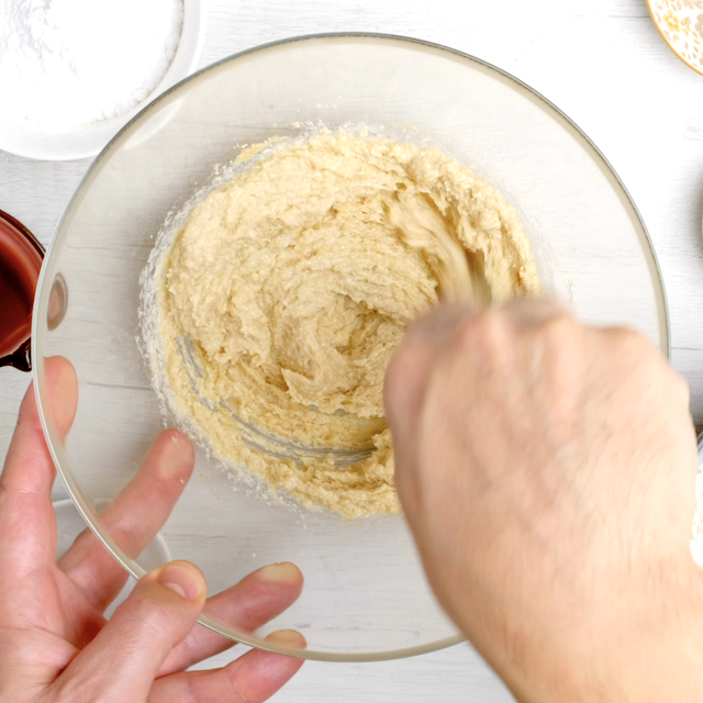 Butter and brown sugar being creamed together.