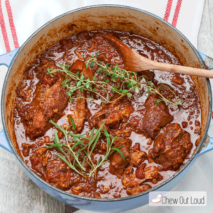 A pot of Pork Ragu with herbs 