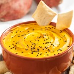 Sweet Potato Hummus with Crackers and Black Sesame Seeds