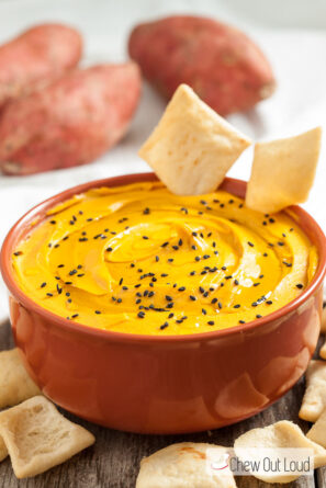 Sweet Potato Hummus with Crackers and Black Sesame Seeds