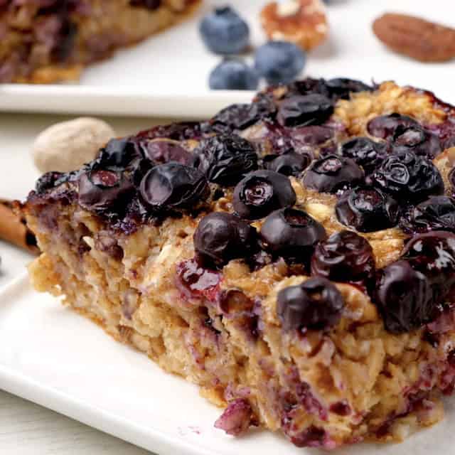 Slice of freshly baked blueberry oatmeal.
