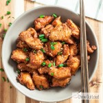 Bowl of Chicken Mochiko with Chopped of Scallions