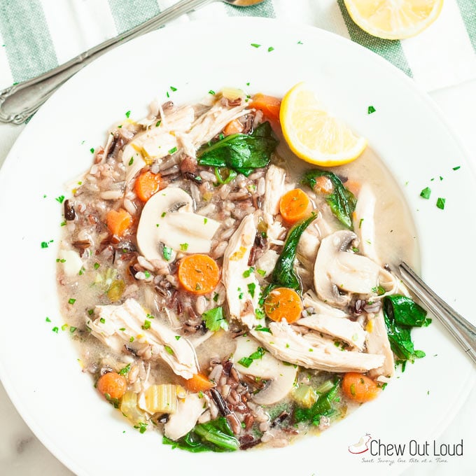 Lemon Chicken Wild Rice Soup in a white bowl with spoon 