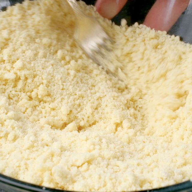 Butter added to flour mixture to make boston cream cupcake batter.