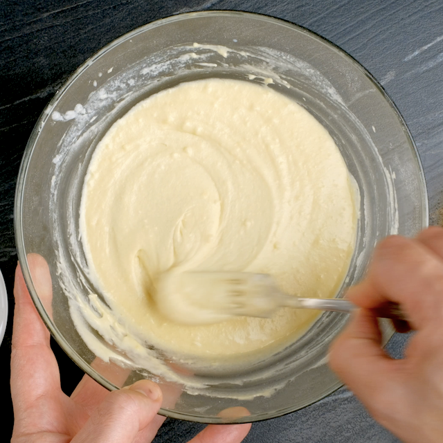 Boston cream cupcake batter being whisked until light and fluffy.
