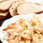 A Plate of Garlic Shrimp with Bread