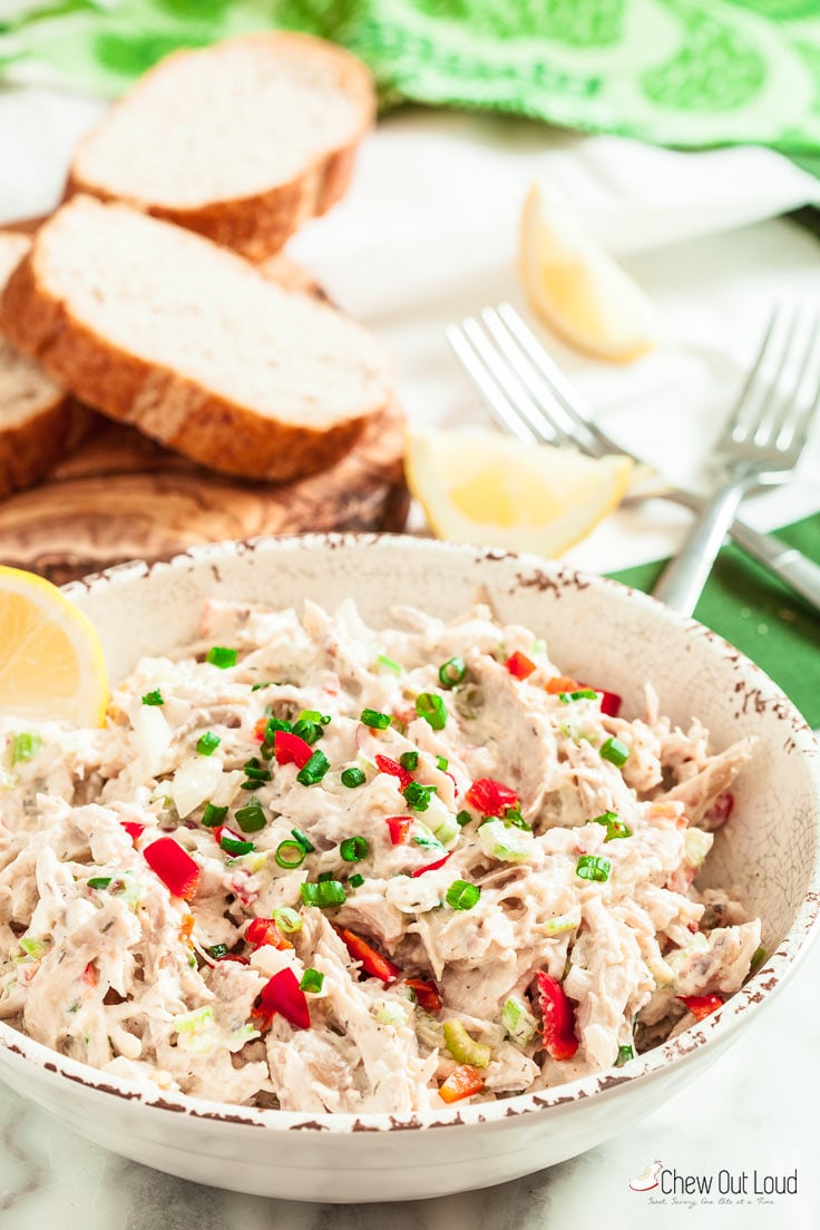 rotisserie chicken salad in a bowl with bread slices