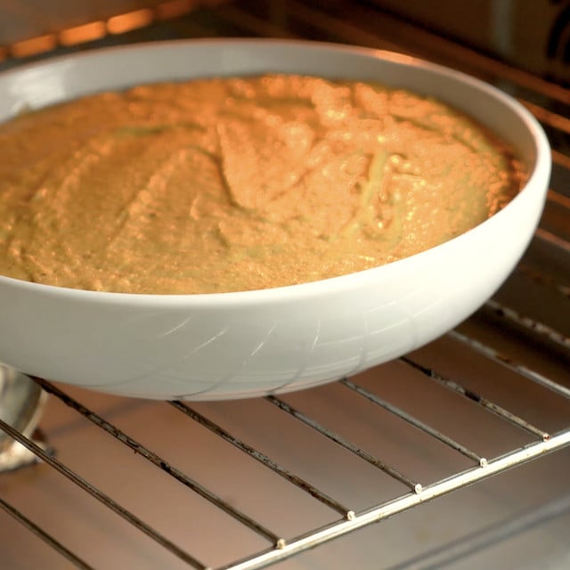 Pumpkin cornbread being baked in the oven.