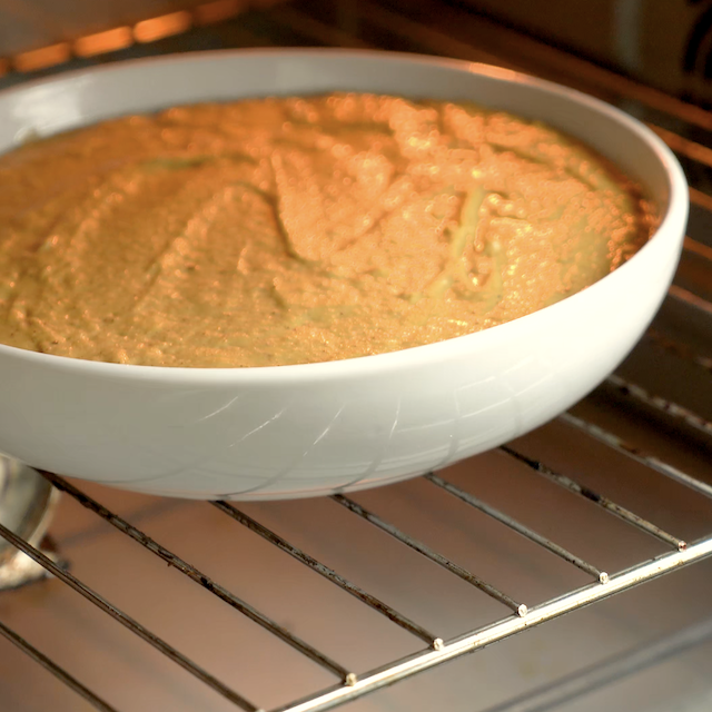 Pumpkin cornbread being baked in the oven.