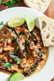 Red Thai Curry Mussels with Lime Wedges and Fresh Cilantro