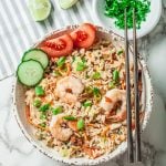 Thai Fried Rice with Shrimp and Sliced Tomato and Cucumber