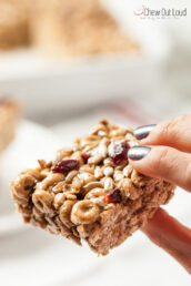 A piece of no bake of nut-free cereal bar