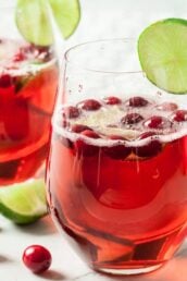 A glass of cranberry prosecco cocktail