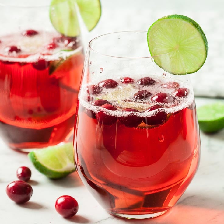 A glass of cranberry prosecco cocktail