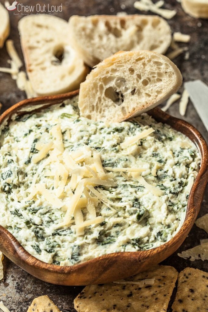 Close up of Spinach Artichoke Dip with Garlic Bread