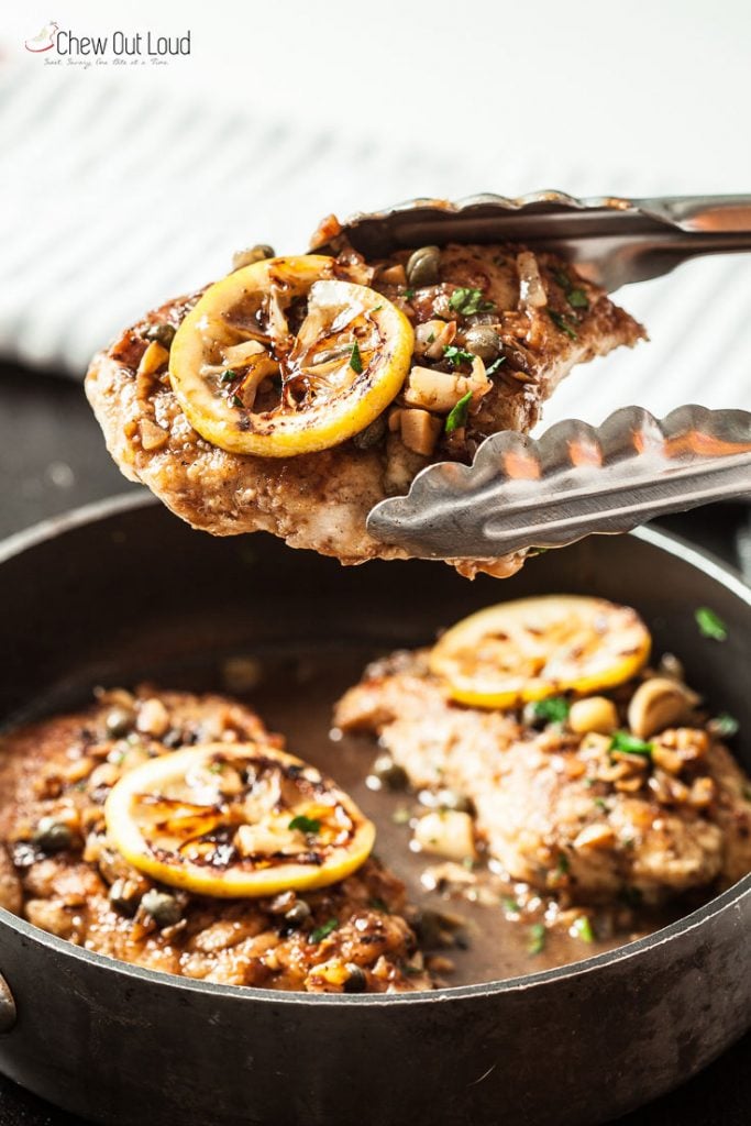 chicken piccata cooking in a pan